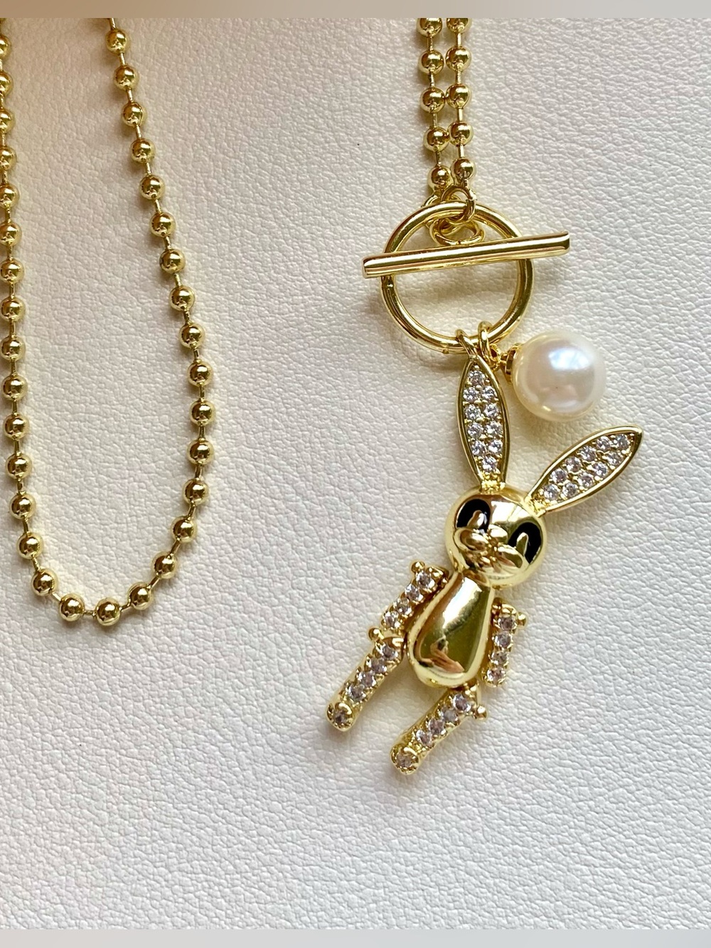 Gold Bunny Pendant Necklace with Pearl Accent